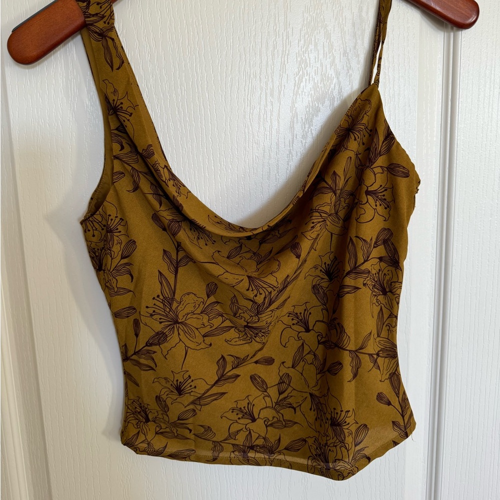 Beautiful asymmetrical draped neckline sleeveless chiffon floral top from Lulus